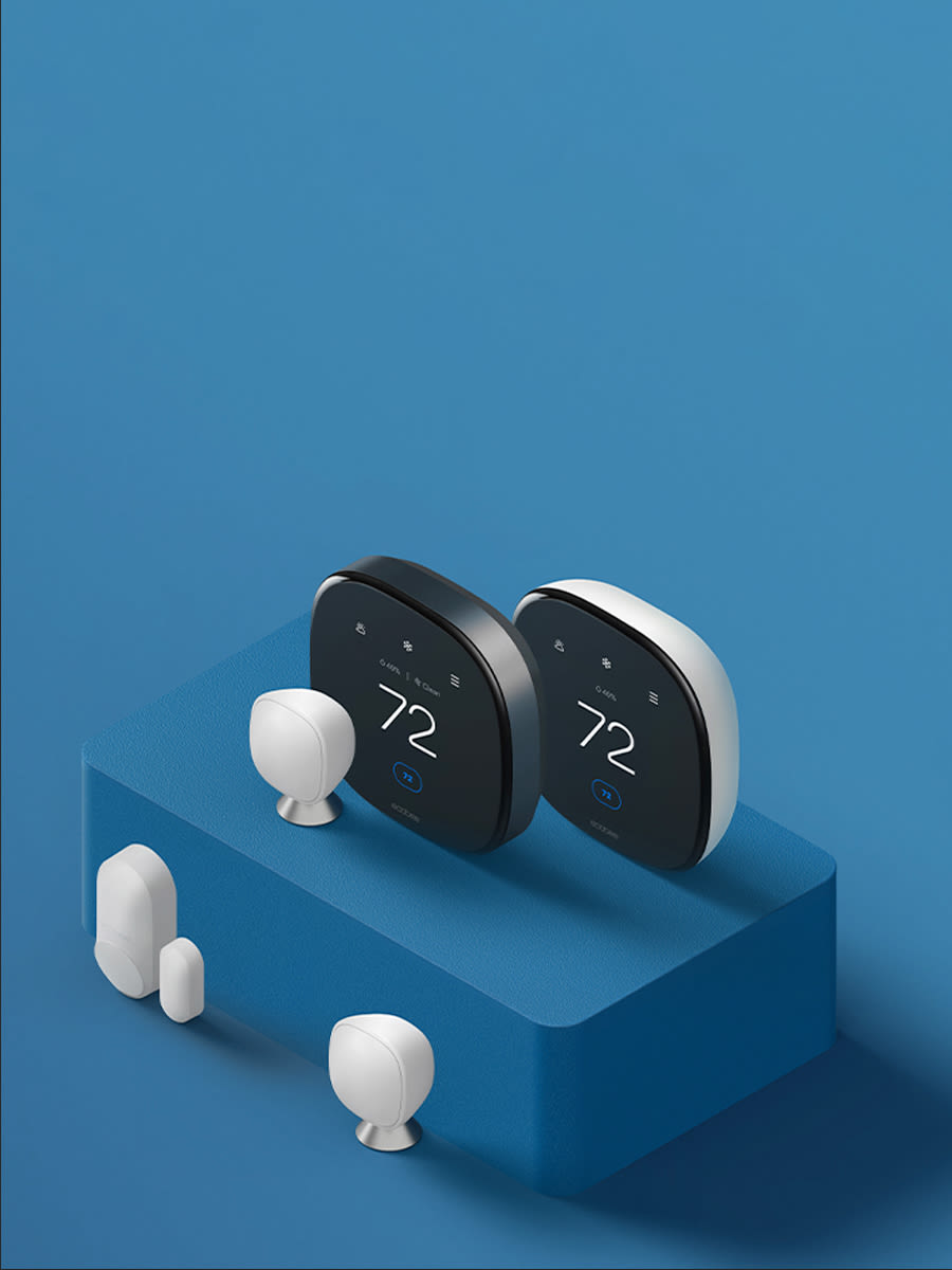 An image showing two ecobee smart thermostats and three sensors arranged on a blue background.