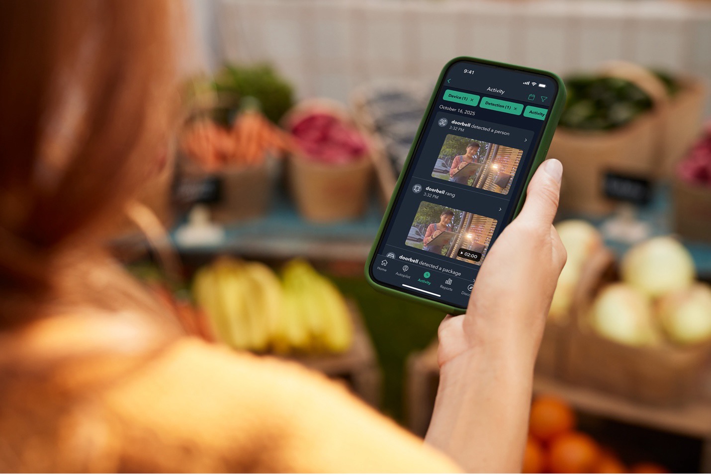 Woman reviewing ecobee Smart Security Activity Feed.