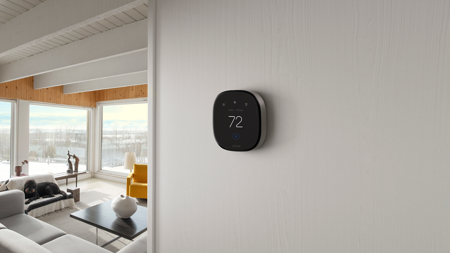 ecobee thermostat on a white wall in a modern home with clean lines.