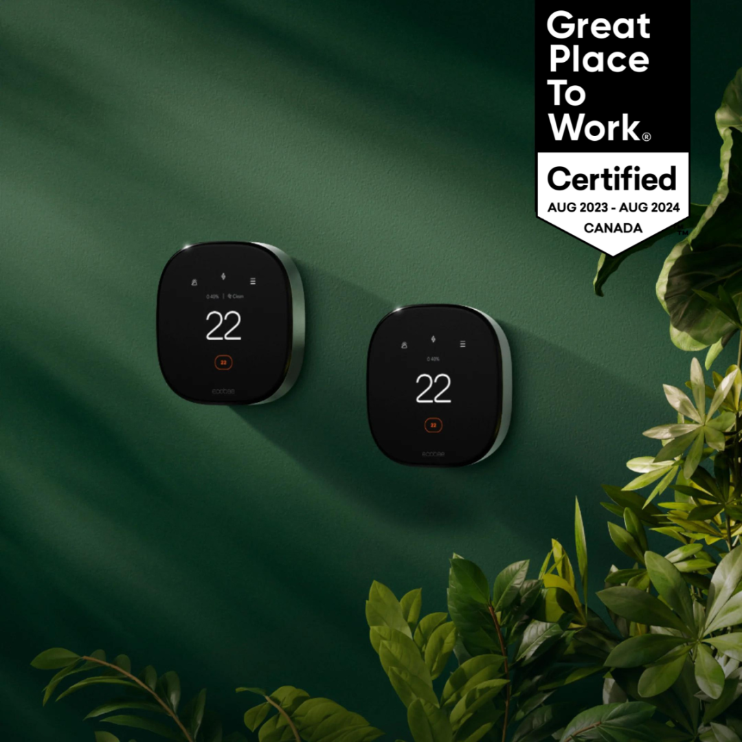 Two ecobee thermostats sit on a green wall beside a plant. A black banner reads “Great place to work Certified. August 2023-August 2024 Canada.”