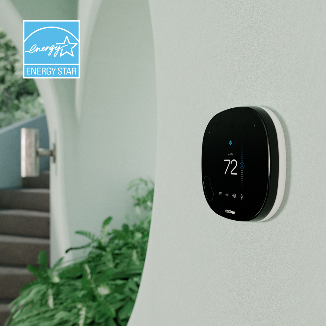 Energy star logo with smart thermostat on wall