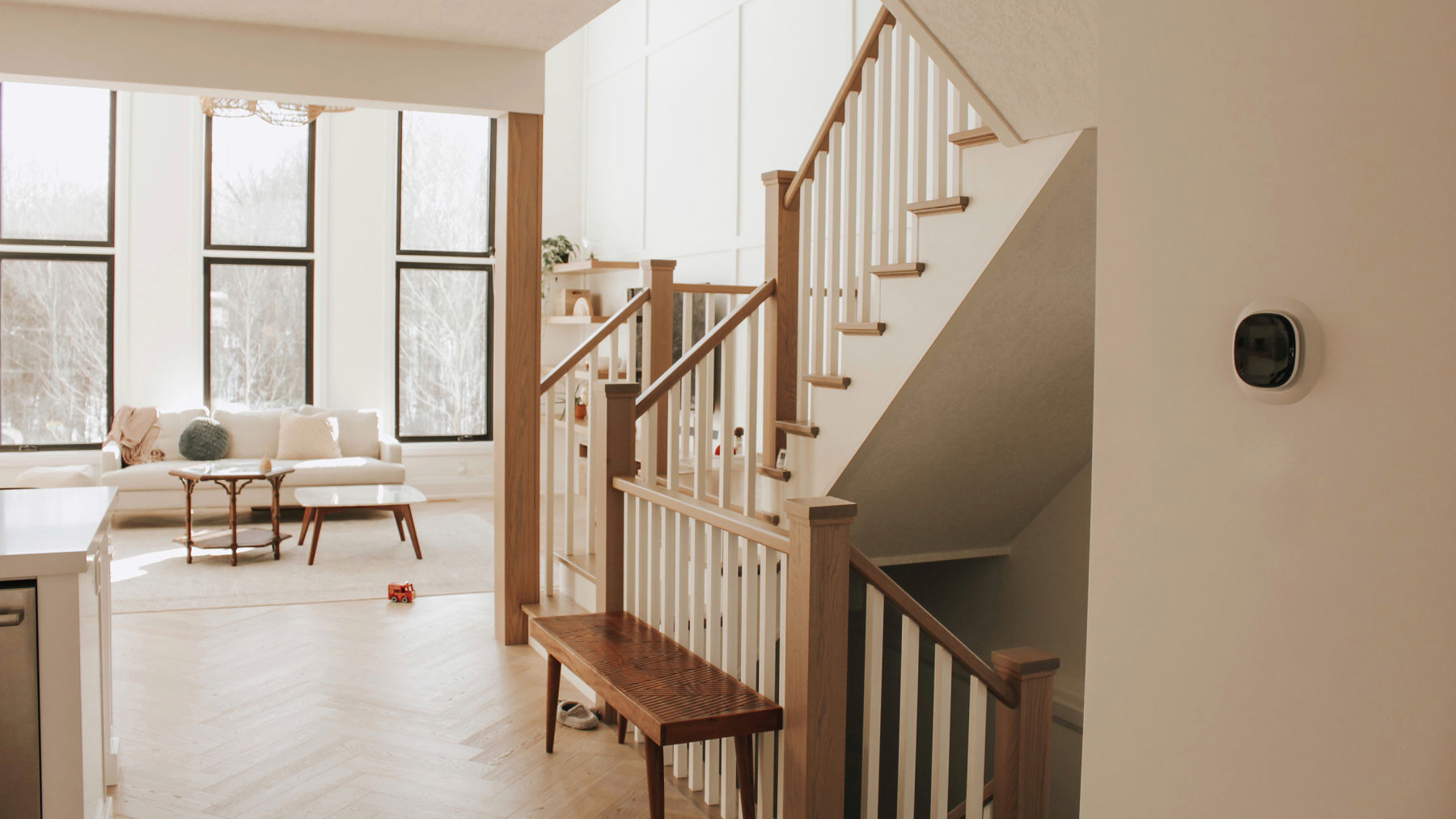 Image of neutral, light-filled living room.