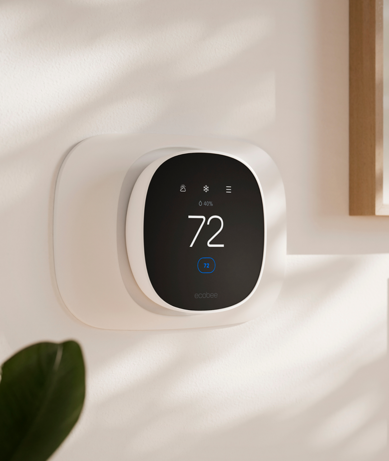 ecobee smart thermostat essential with trim kit on wall