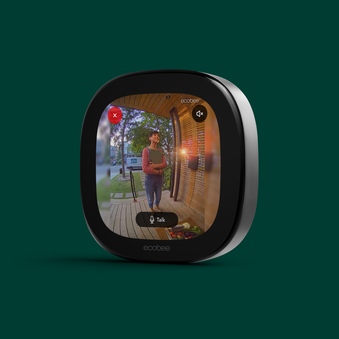 ecobee smart thermostat premium on a green background showing a camera view on its screen