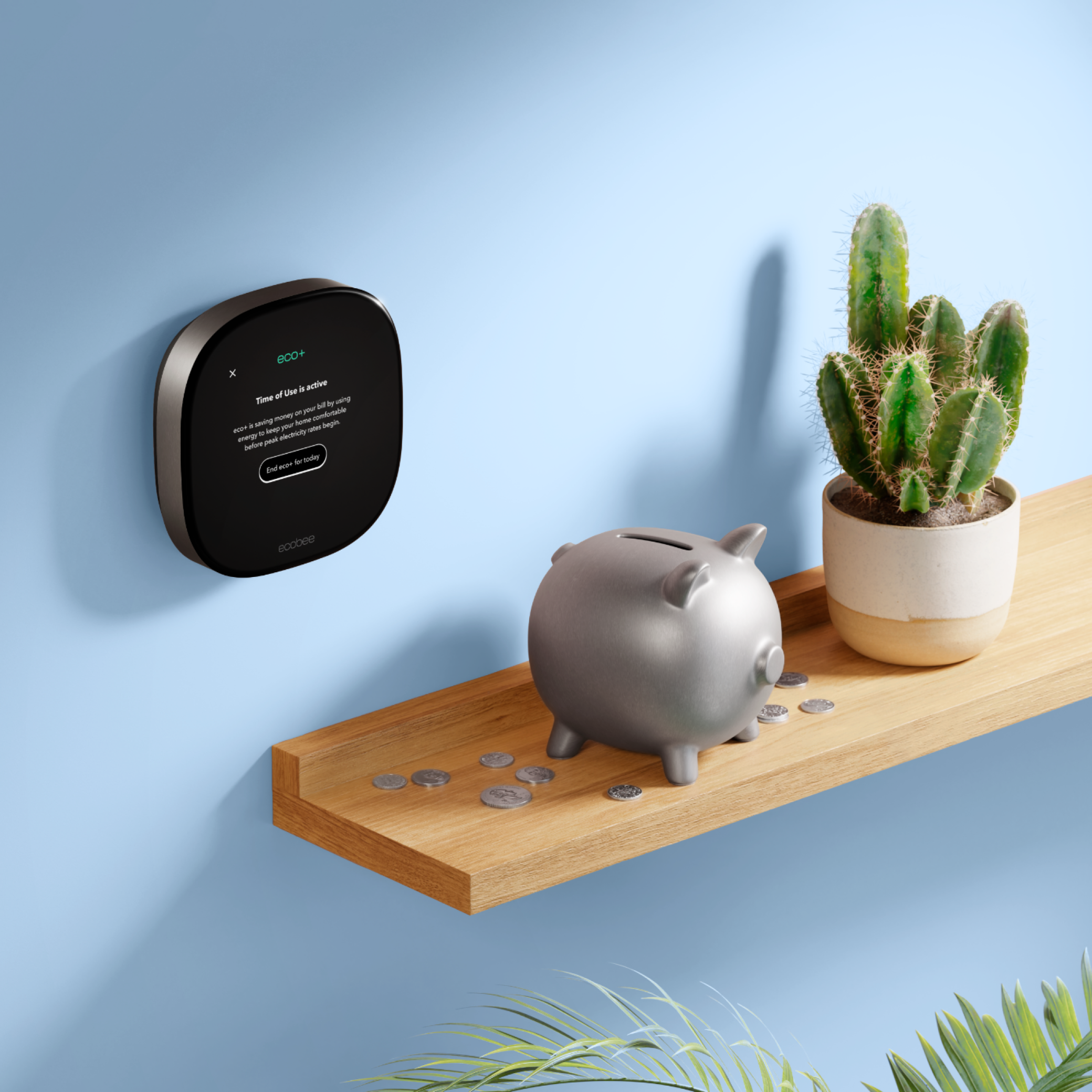 a piggy bank sits on a shelf next to an ecobee thermostat on a wall
