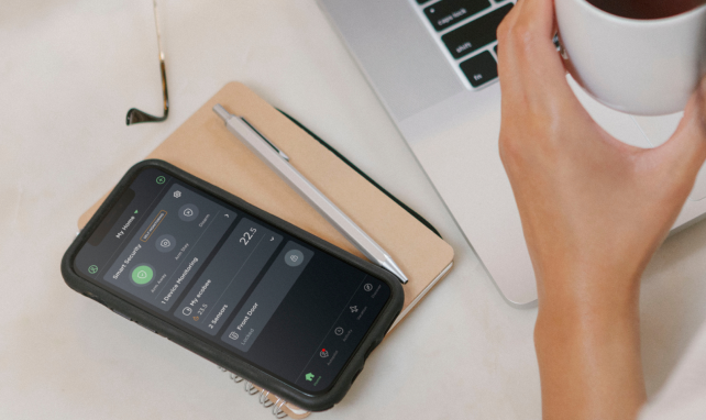 a phone screen shows notifications from the ecobee app