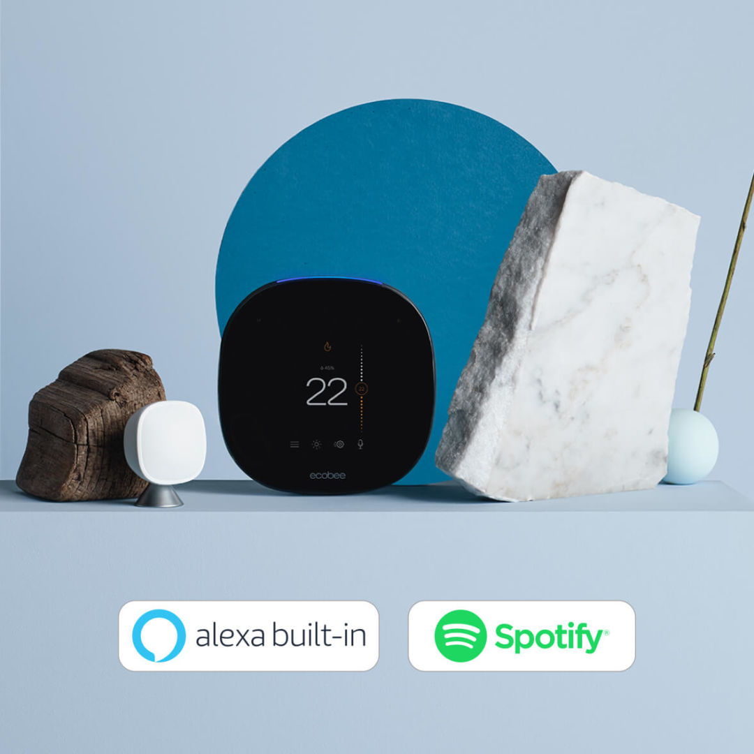 ecobee SmartThermostat with voice control on a blue background with the logos for Alexa and Spotify.