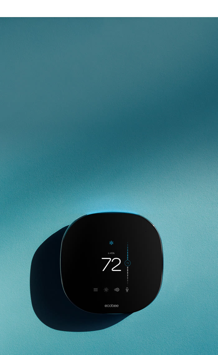 Thermostat on blue background