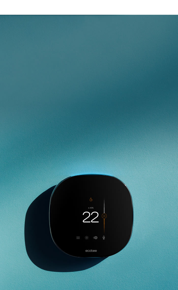 Thermostat on blue background