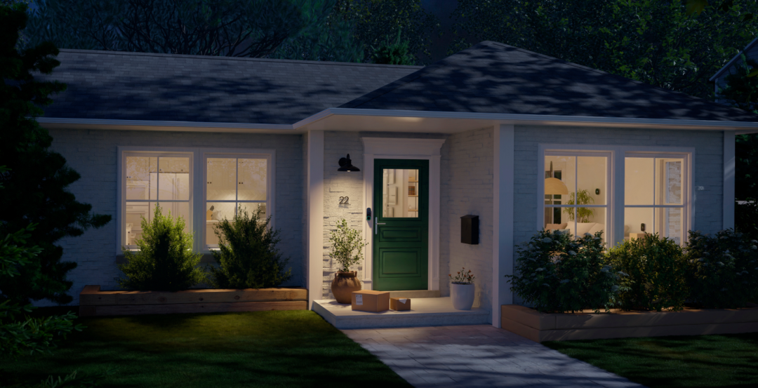 Front porch of a house at night with packages on it.