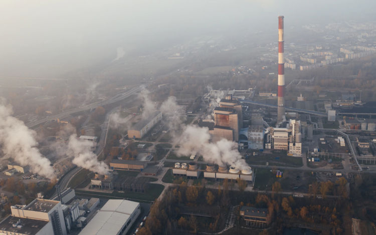 Aerial shot of a coal-fired power plant. Demand response started with utility providers asking their larger corporate customers to cut power usage during emergencies.