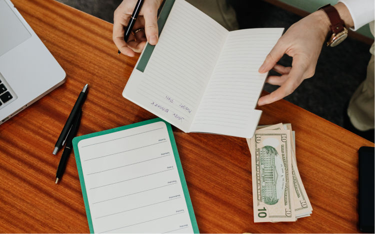 A person counting his rebates and money savings