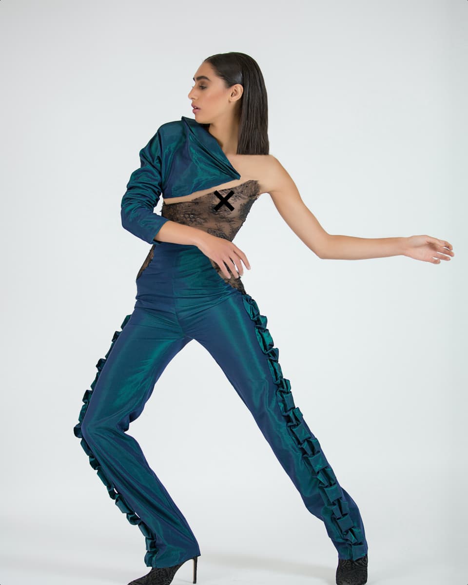 A person wearing a green jumpsuit