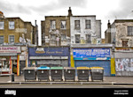 run-down-shop-fronts-in-dalston-london-near-hackney-atmr6w