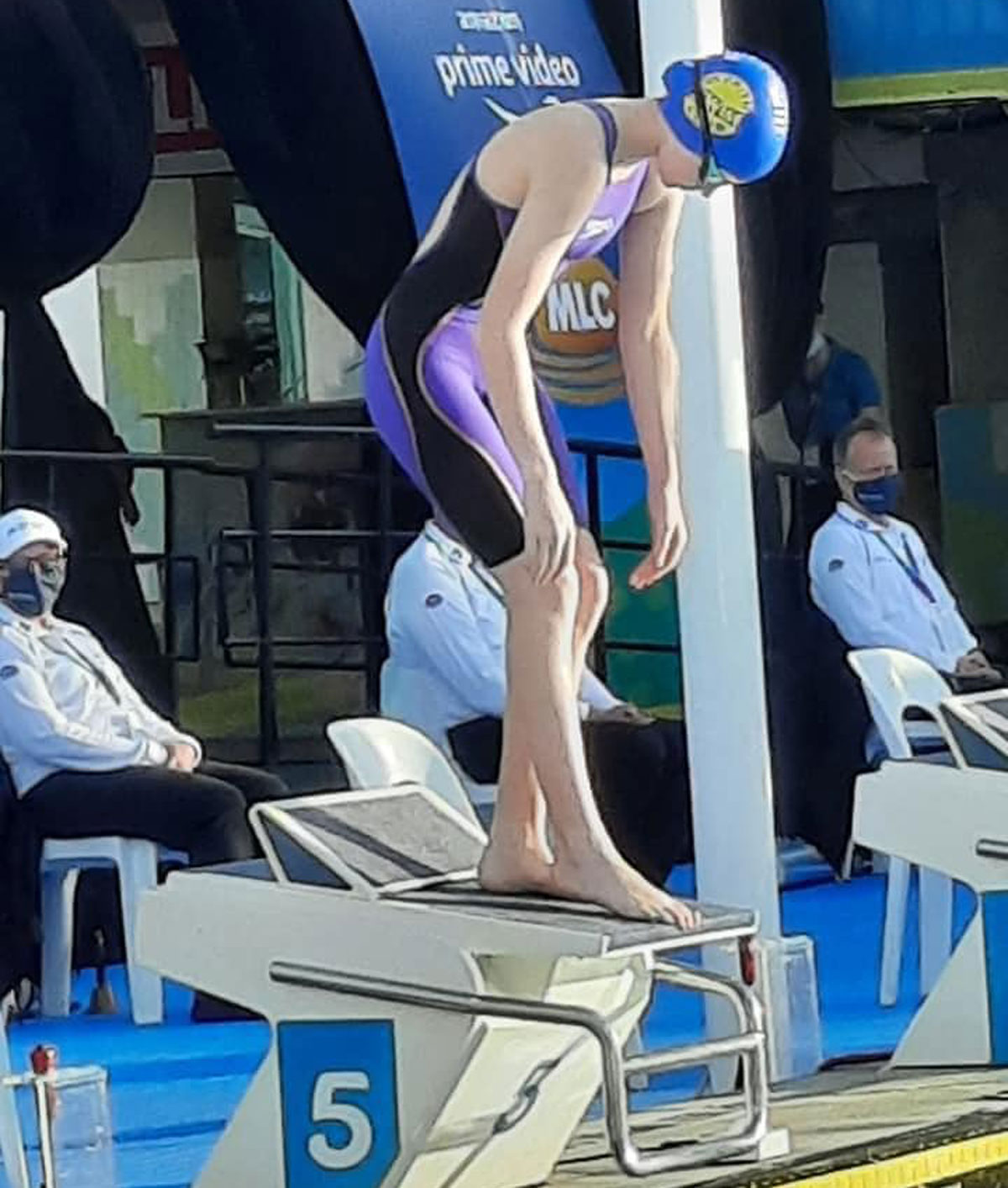 Nicole Taylor prepares to dive from the blocks at the recent Australian National AGe and Australian MC Championships on the Gold Coast.