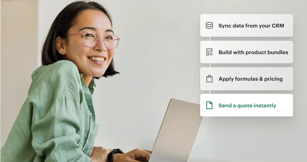Woman with glasses in a light green blouse smiling with her laptop