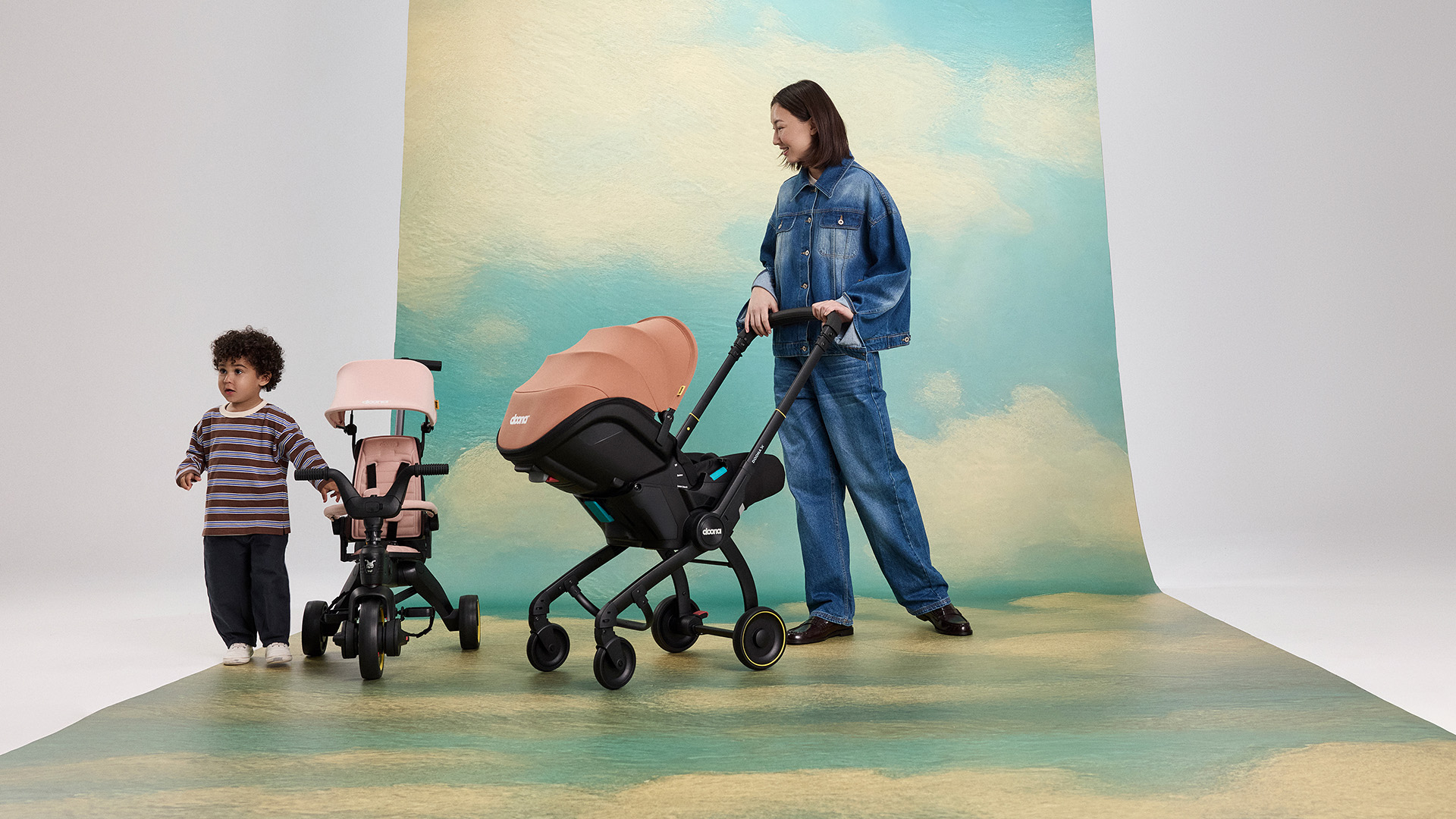 Family using the Doona car seat stroller on a walk