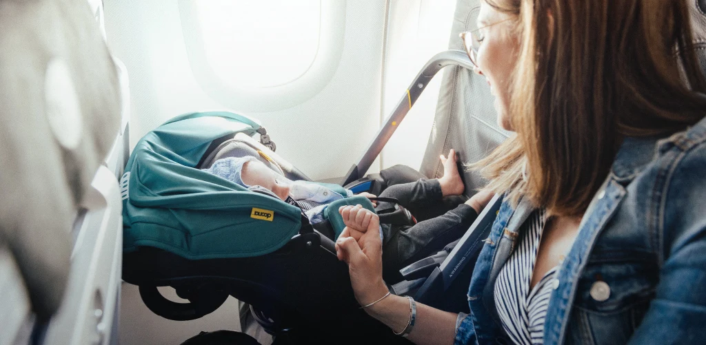 The Ultimate Guide To Flying With a Car Seat [U.S. Airline Policies]