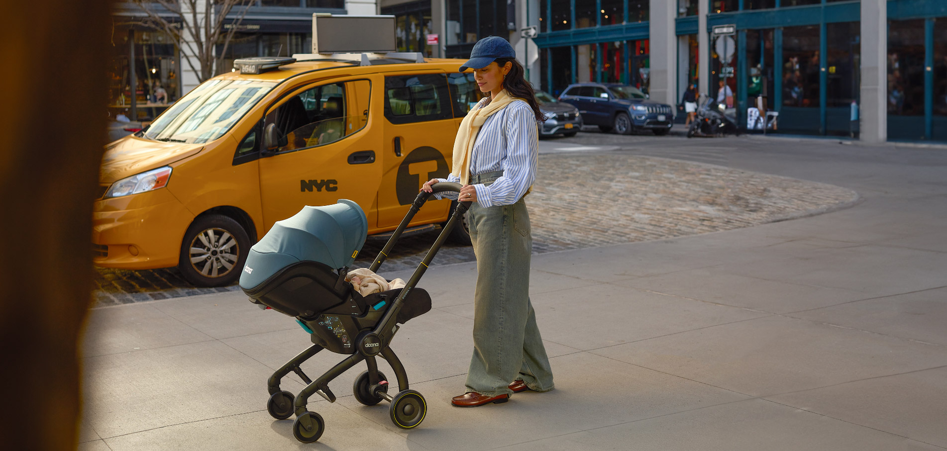 Doona car seat stroller lifestyle editorial photo