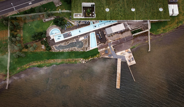 Aerial view of Laugarvatn Fontana by the lake with facilities.