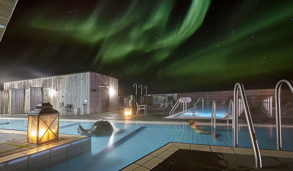 Winter at Laugarvatn Fontana with the Northern Lights overhead.
.