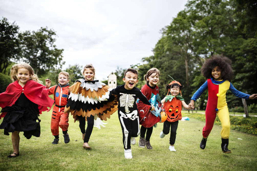 kids in costumes - iStock-1030383314