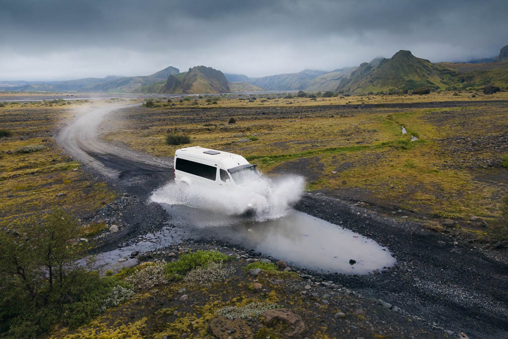 off-road vehicle crossing a stream on the Icelandic Highlands