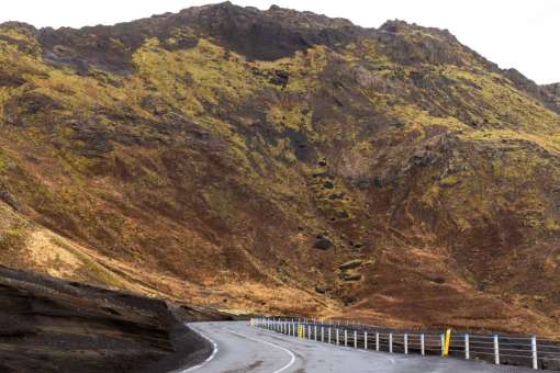 Winding Road through Volcanic Hills near Grindavík