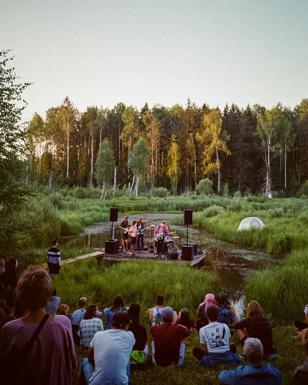 Band playing in a field