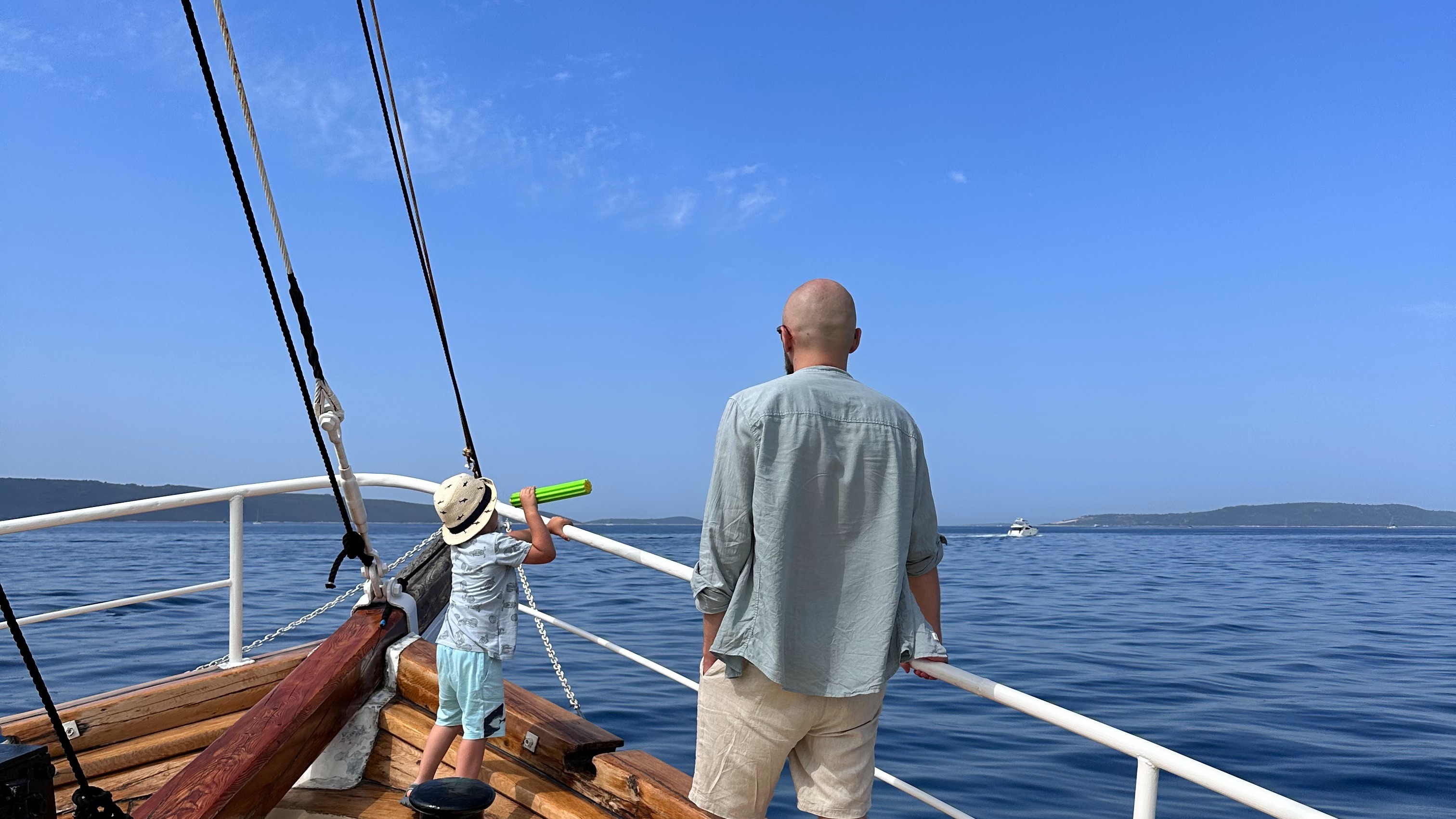 Father and his son on the boat