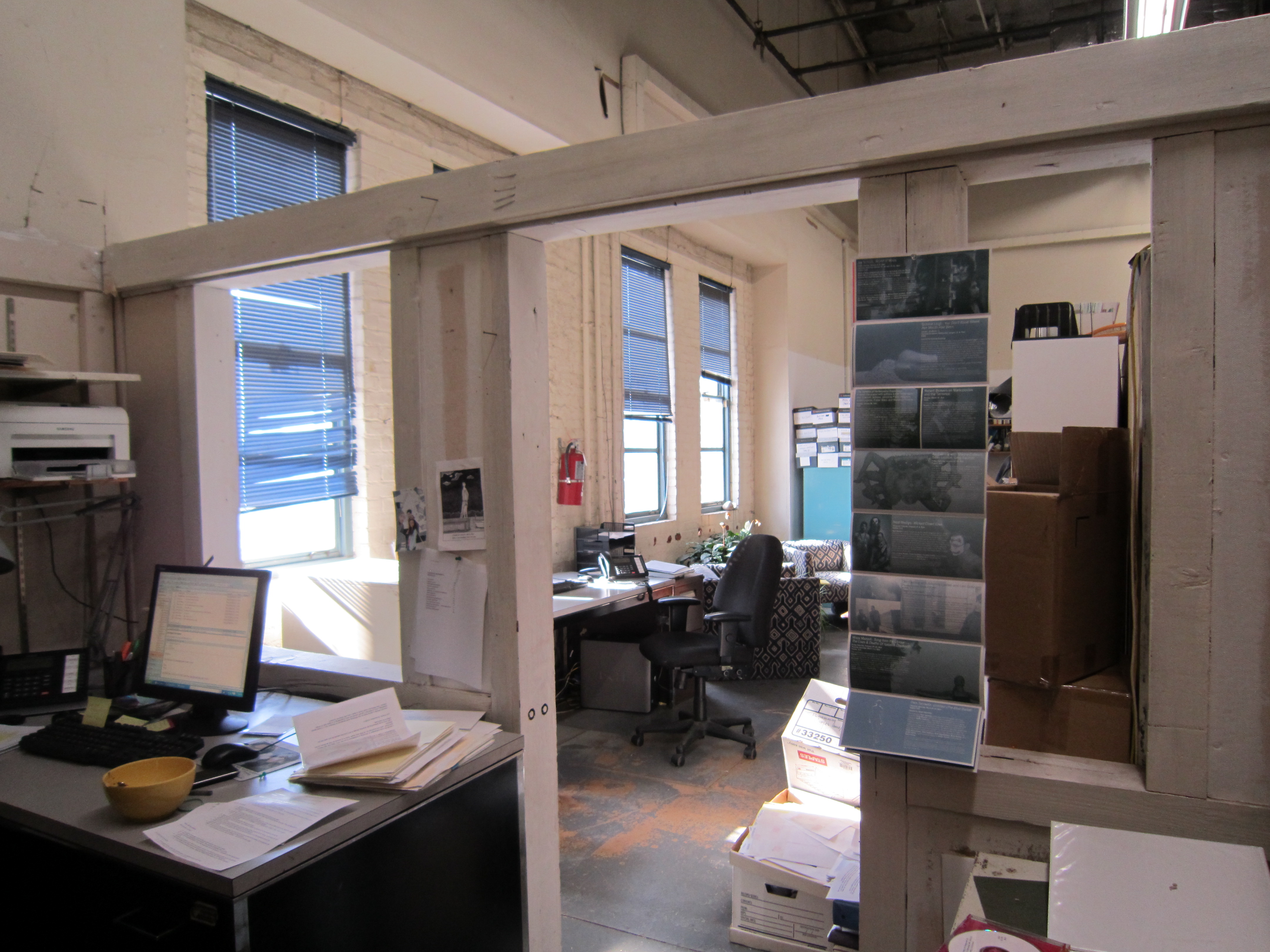 Fawn Krieger, photo of Curator Lumi Tan’s desk in third-floor office space at The Kitchen, 2012. Artist reference image for Property Acts, 2012. 