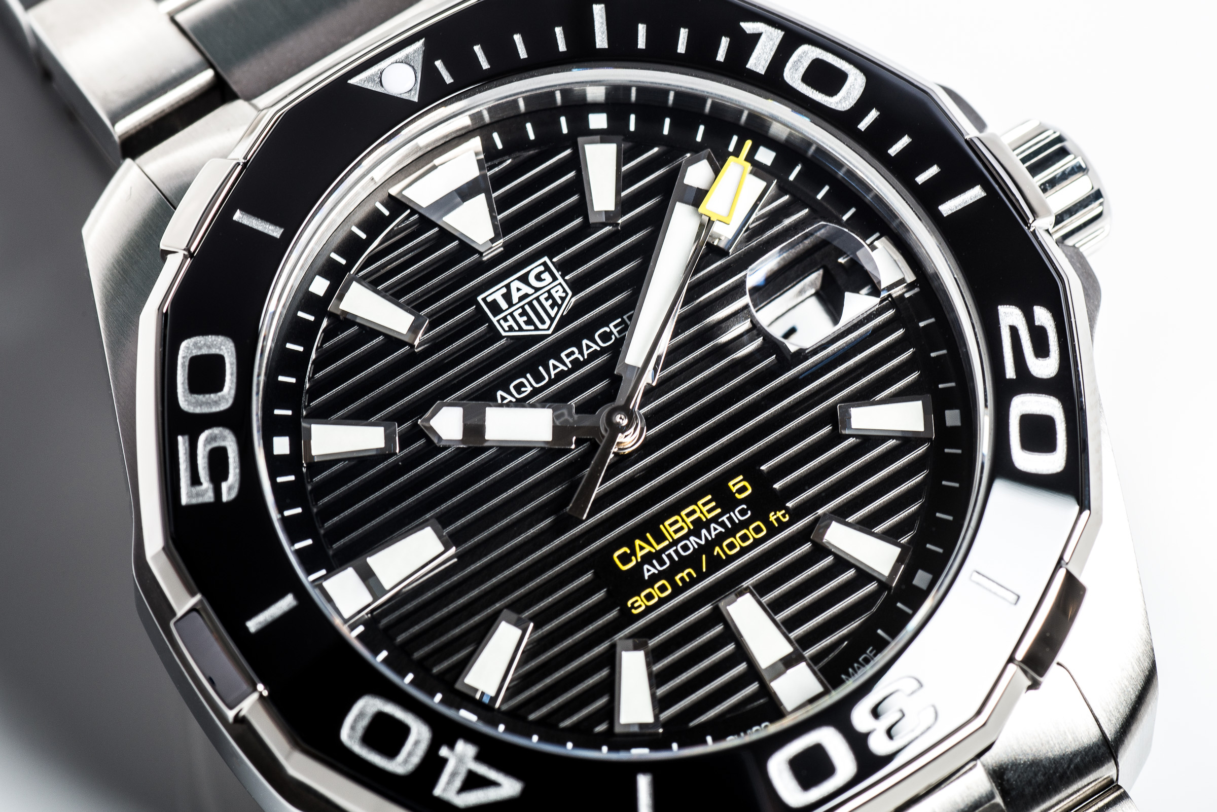 Breitling superocean vs tag hotsell heuer aquaracer