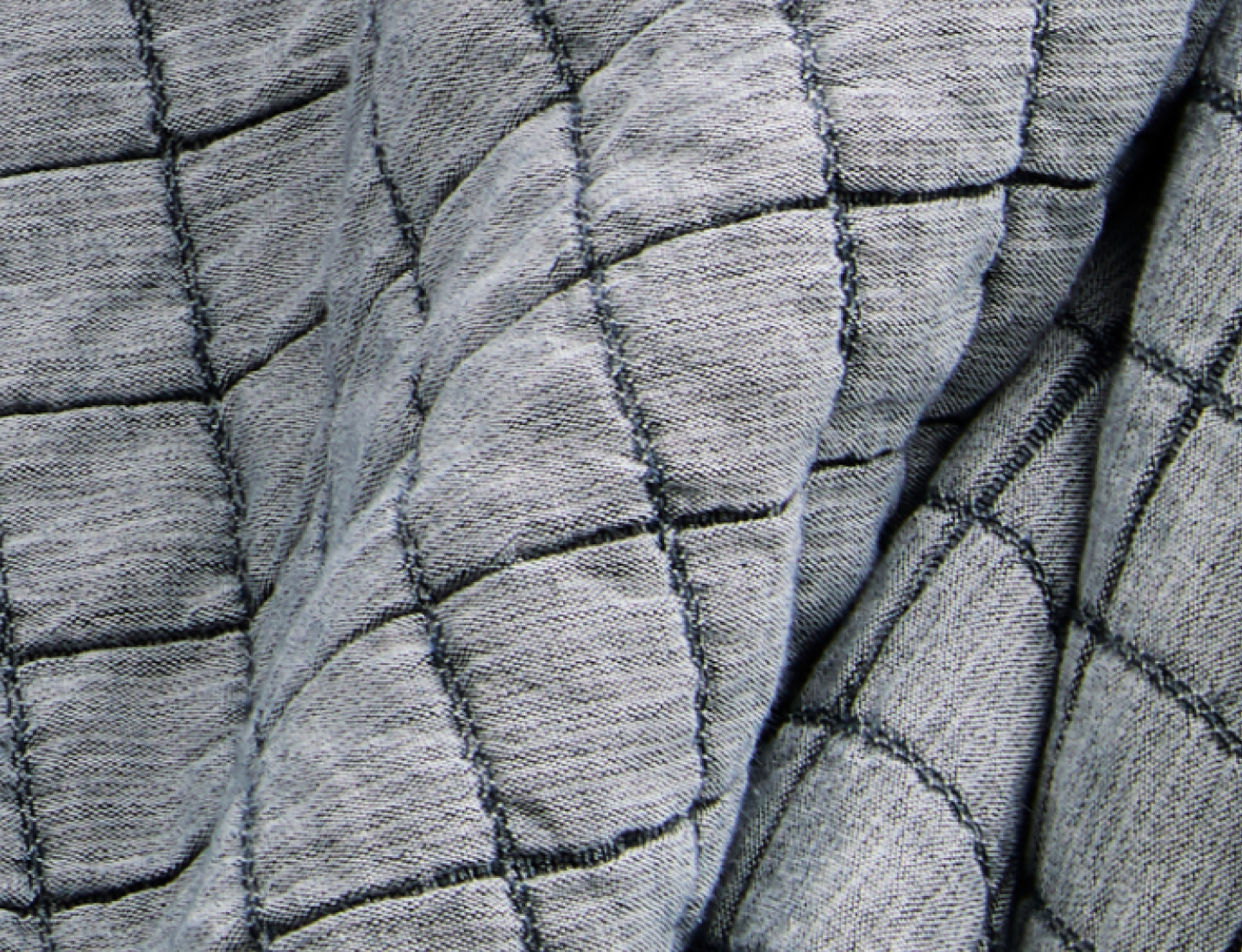 Fabric close up of the Matelasse Windowpane Duvet Set in Chambray Blue