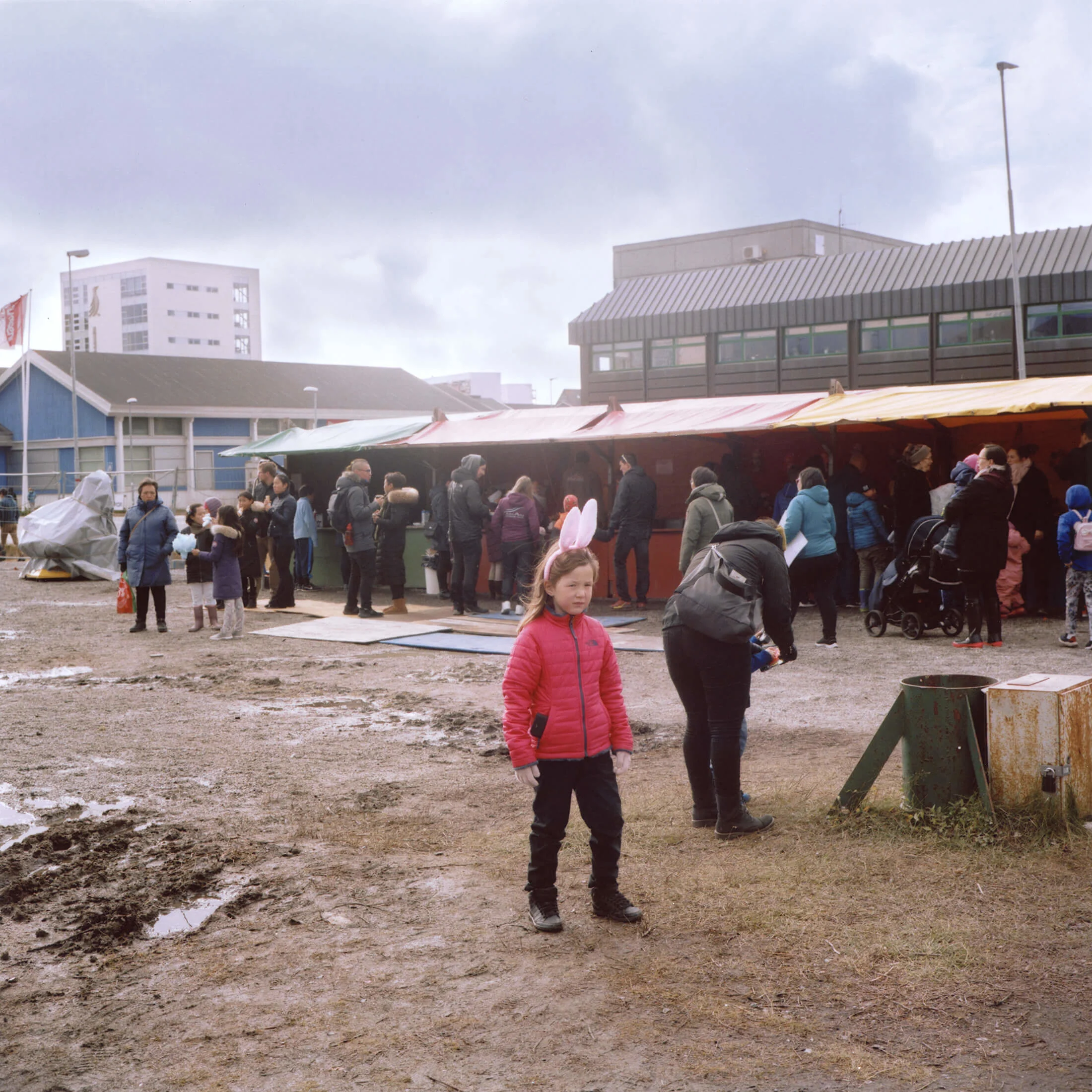 Examples of Nuuk’s modern architecture, taken by the sea at sunset. | At Tivoli Nuuk, a funfair in the center of town.