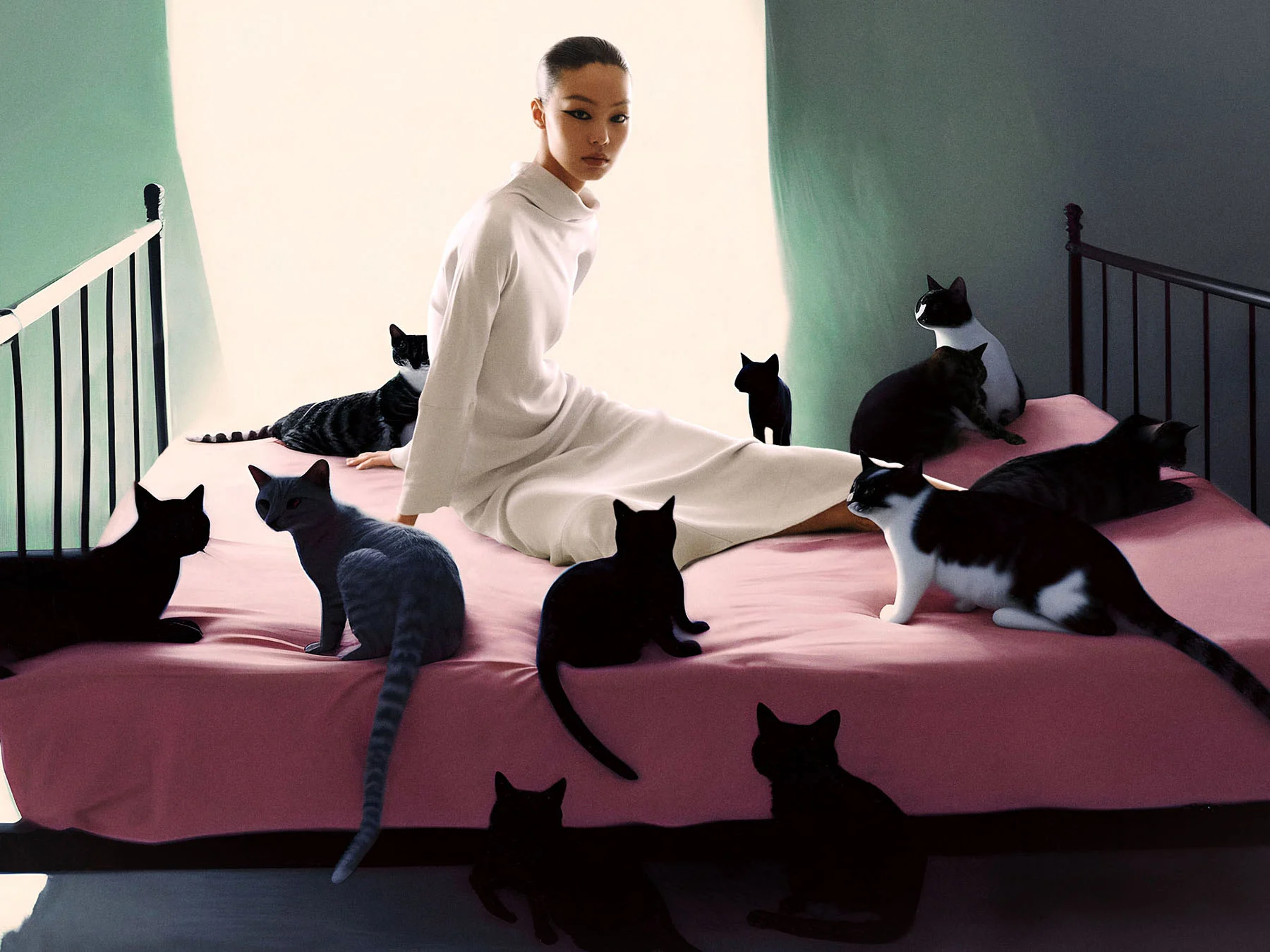 An image, created using a combination of photography and AI technology, of female model Feng Qisi seated on a bed with eight cats lounging around her. 