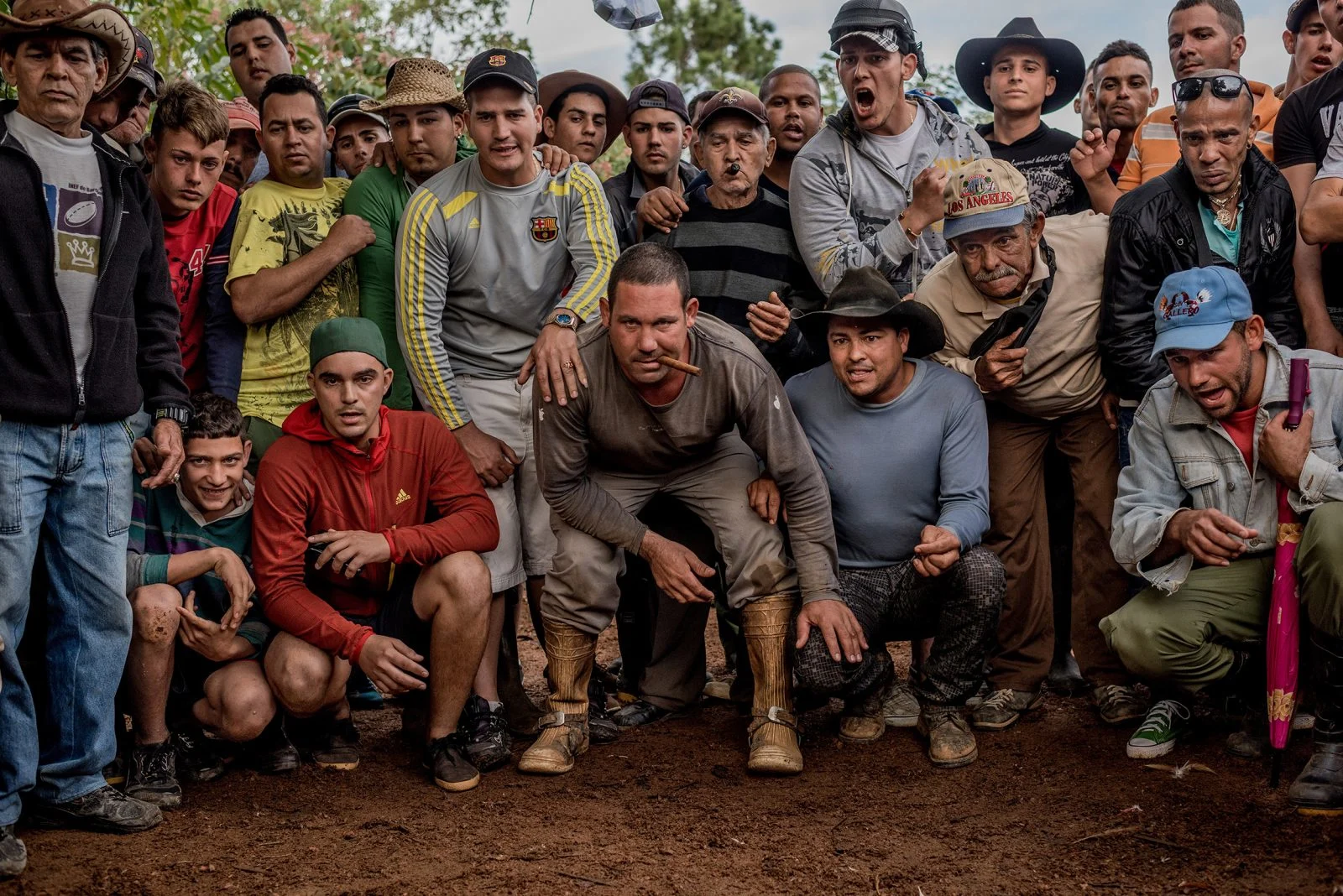 A crowd gathered to watch a cockfight in the countryside near Vinales, Cuba on January 25, 2016.