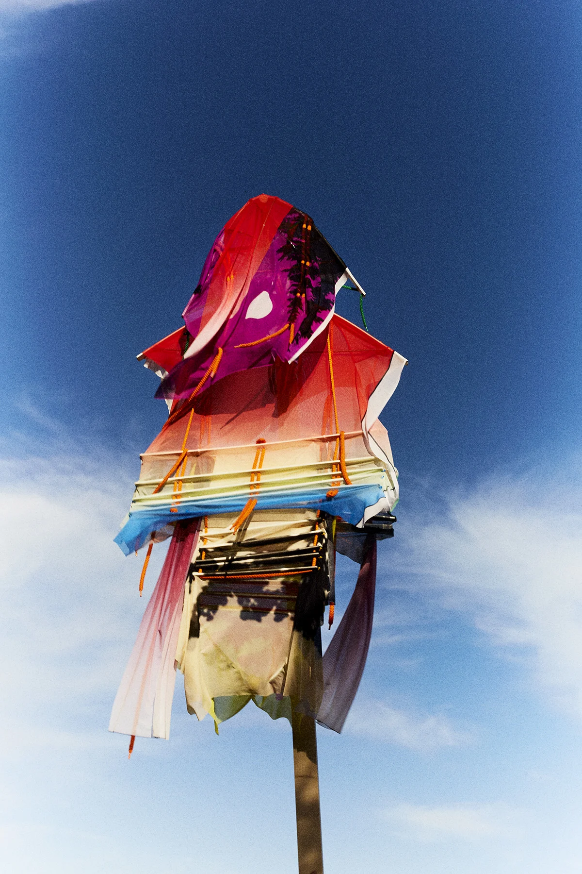 Left: Spring/Summer '18, Jersey Kite Sculptures - Right: Autumn/Winter '20, Watching Window Sculptures