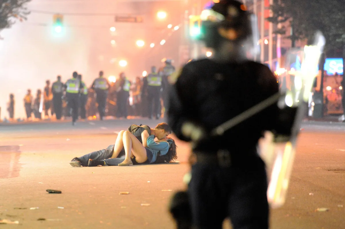 “Vancouver Riot Kissing Couple” by Richard Lam / Getty Images