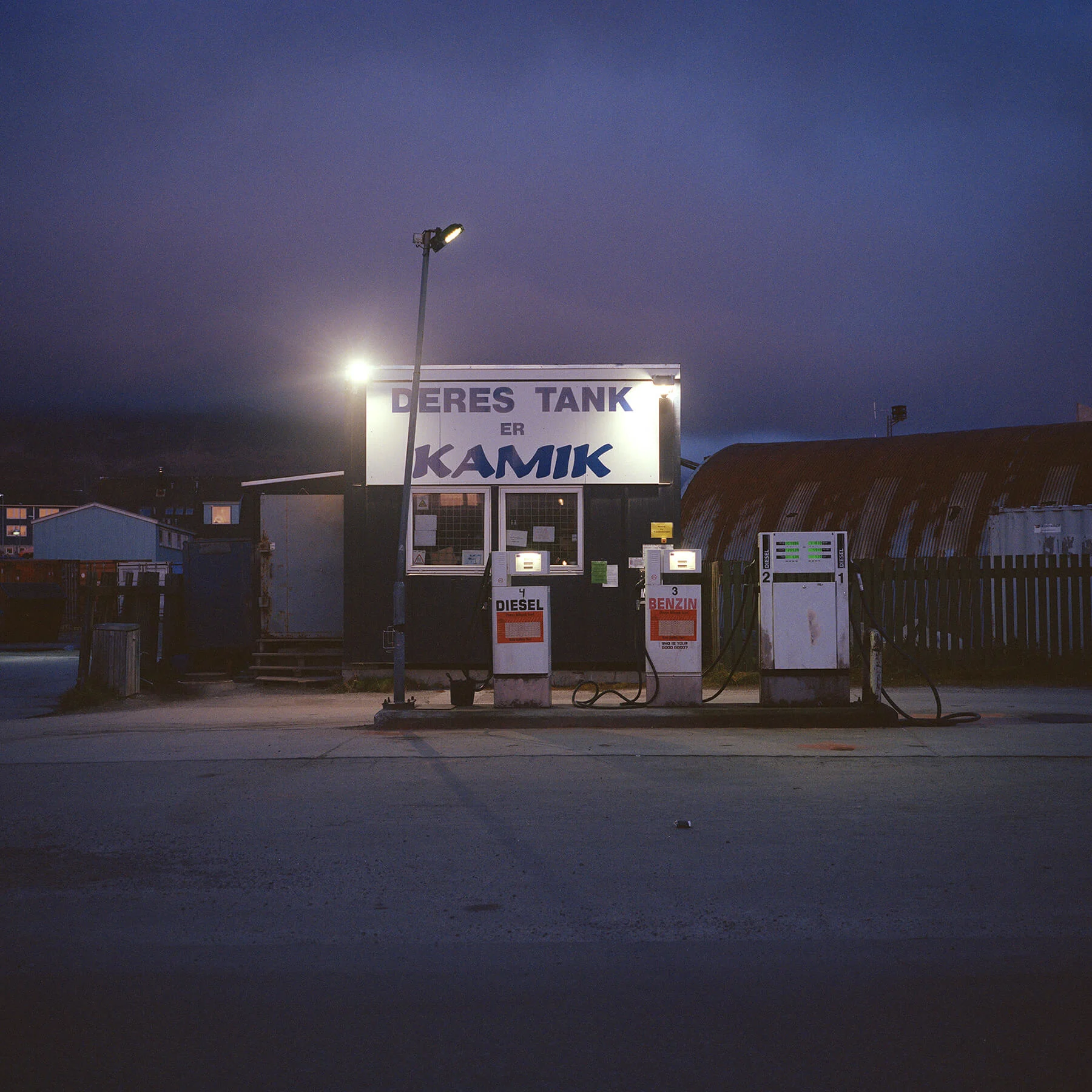 A petrol station at dusk.
