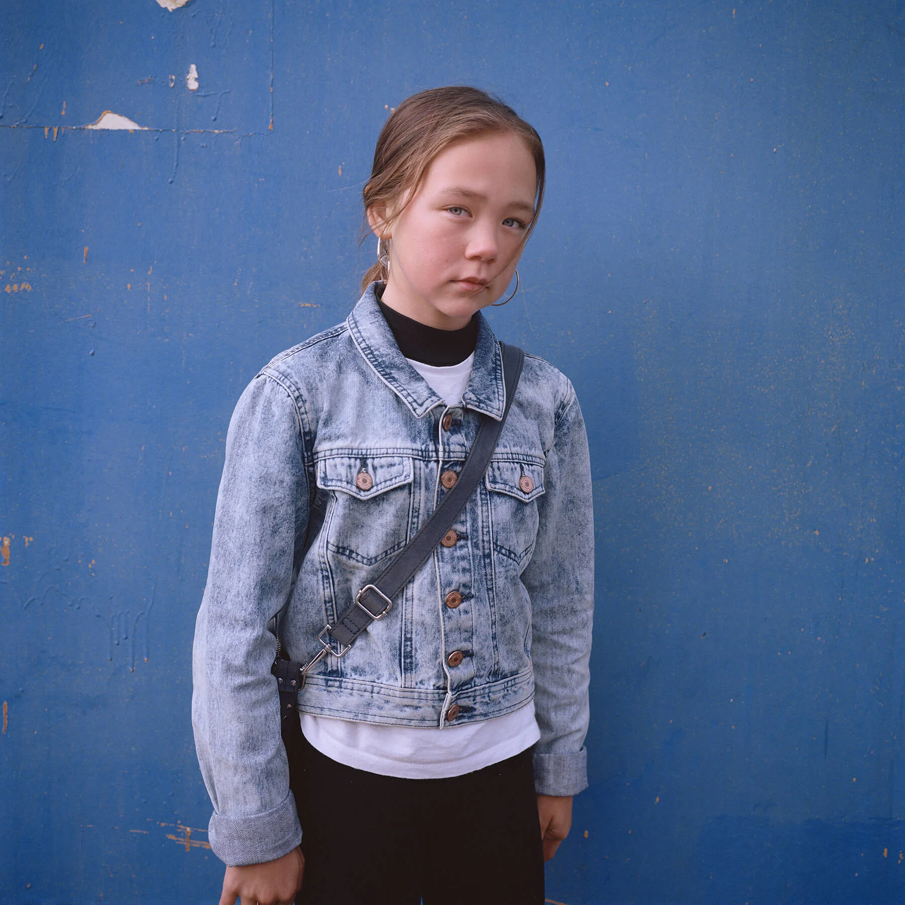 Erina, a young girl from Nuuk, half Greenlandic, half Danish. | One of Nuuk’s old housing blocks.
