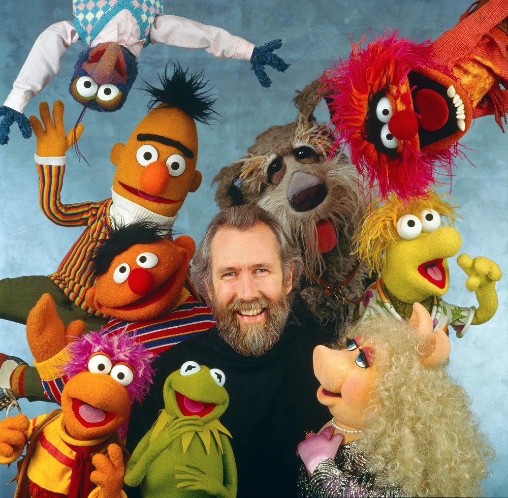 Jim Henson with some of the Muppets from Sesame Street, The Muppet Show, and Fraggle Rock.