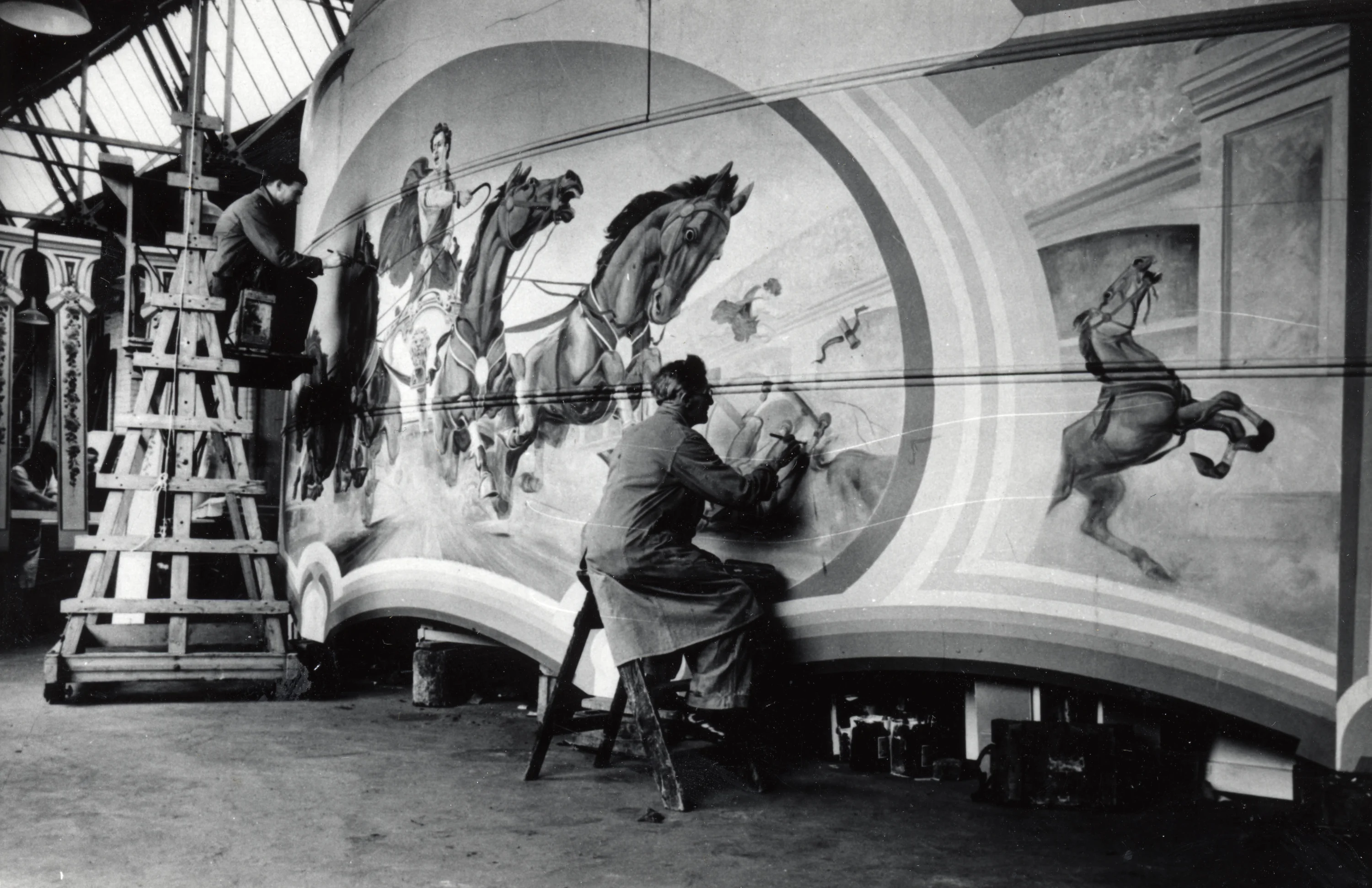 George Orton, Sons and Spooner Limited works photograph showing fairground artists Sid and Albert Howell painting Ark ride A100 1946.¹
