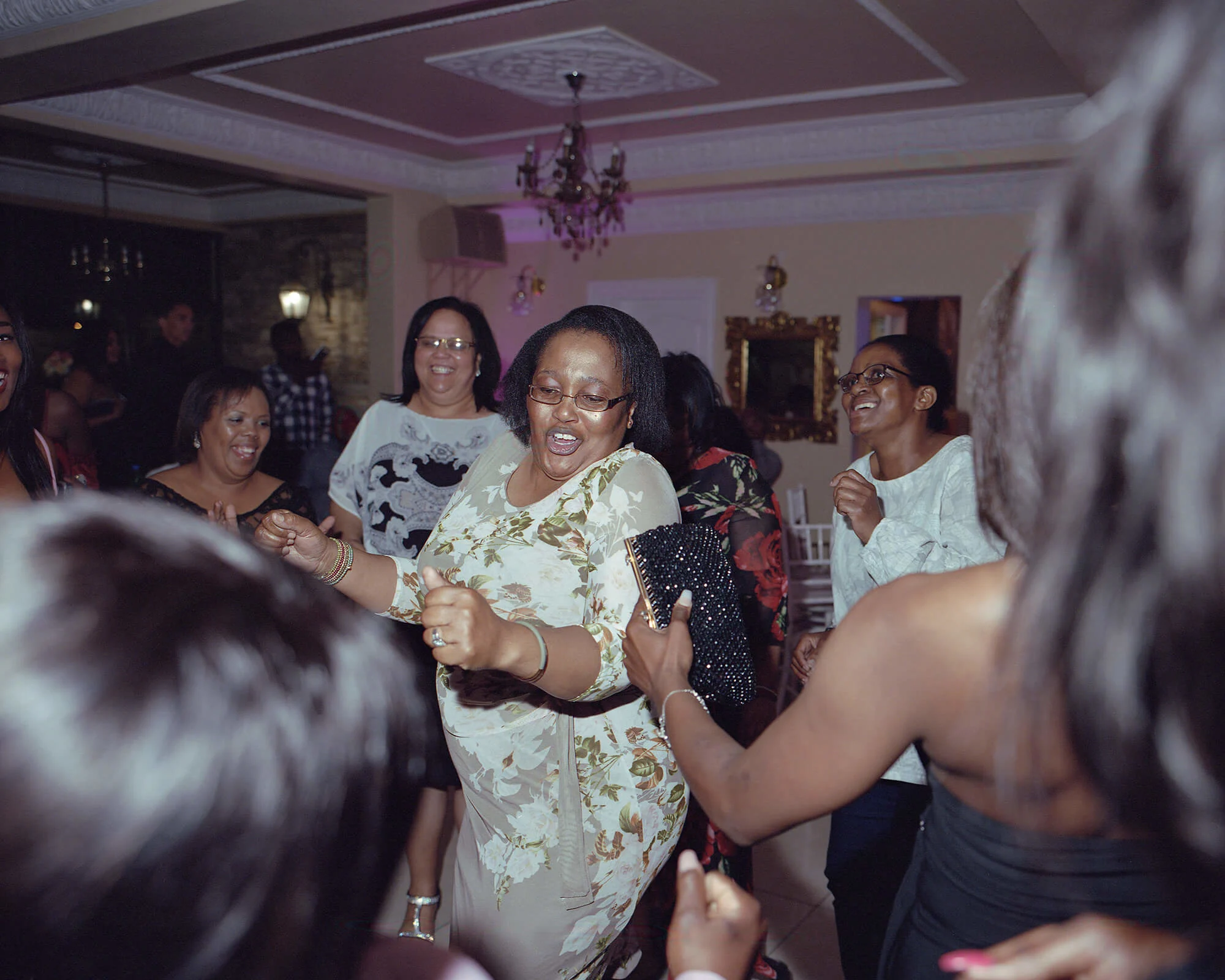 Everyone got involved in the festivities once the dancing started. The teachers and students mingle, surrounding teacher Zadile Dweba.
