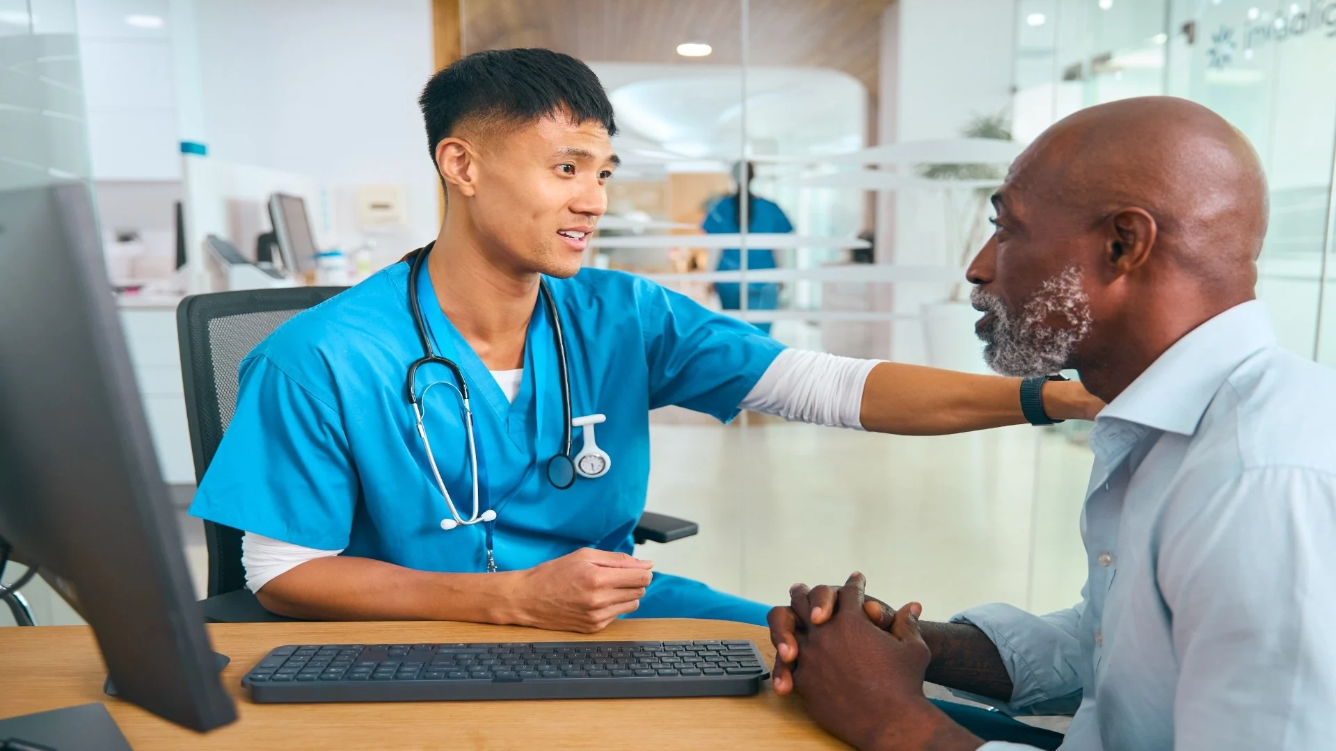 male-doctor-wearing-scrubs-at-hospital-appointment-2024-10-21-18-45-42-utc