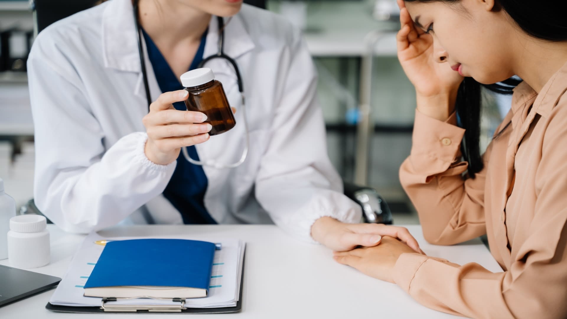 the-doctor-holds-the-patient-s-hand-healthcare-an-2024-11-01-21-25-29-utc