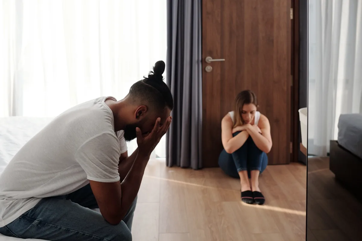 Opioid Addiction: Depressed couple sitting in silence