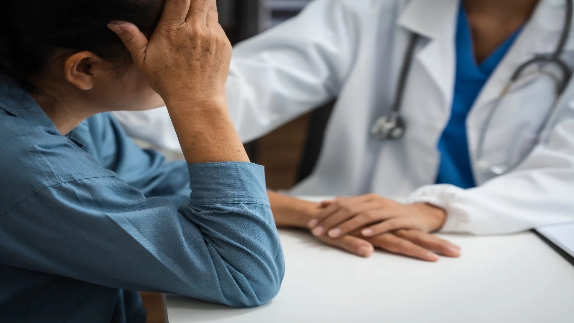 mature-chinese-woman-in-consultation-with-a-doctor-2025-03-05-10-06-51-utc