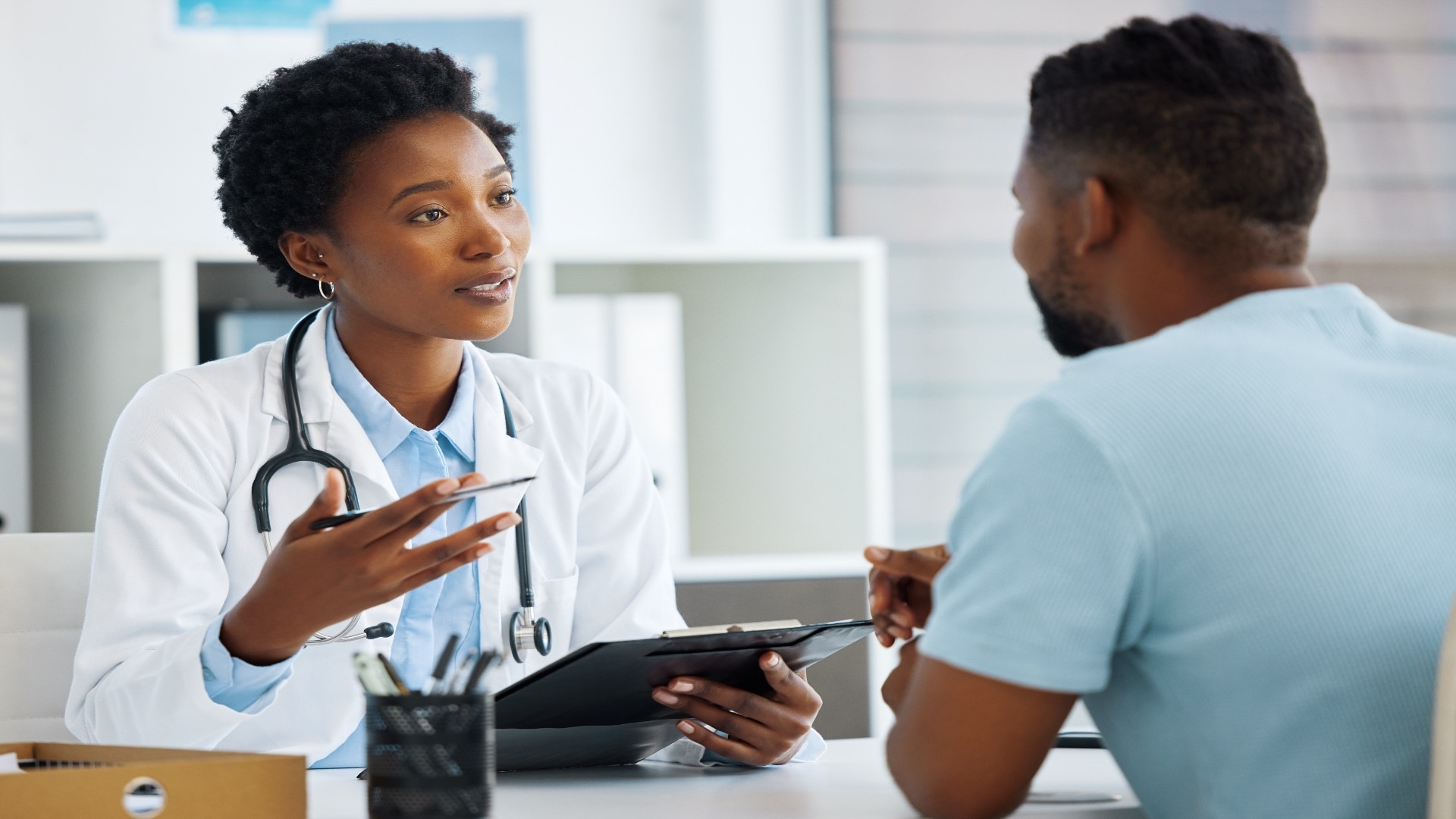 shot-of-a-doctor-having-a-consultation-with-a-pati-2025-04-06-00-28-54-utc shot-of-a-doctor-having-a-consultation-with-a-pati-2025-04-06-00-28-54-utc