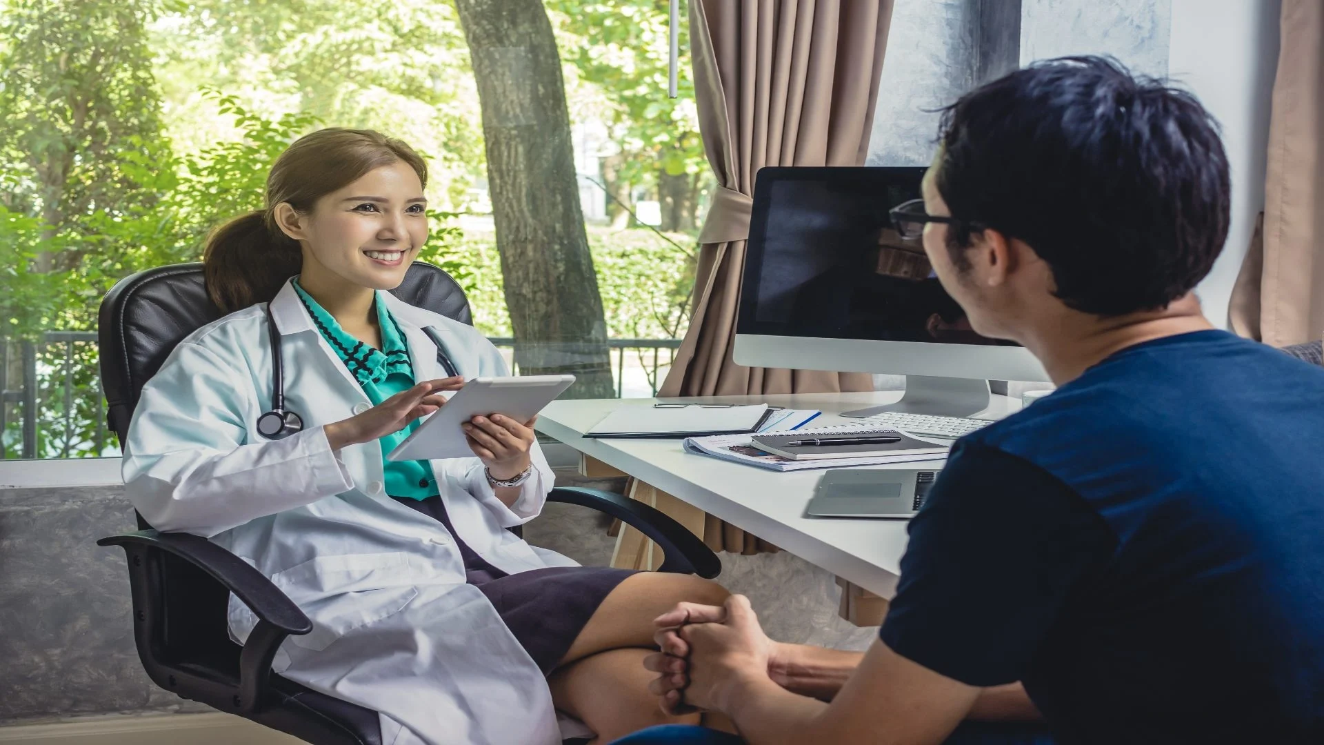 asian-young-doctor-discussing-diagnosis-with-patie-2024-10-20-00-51-08-utc