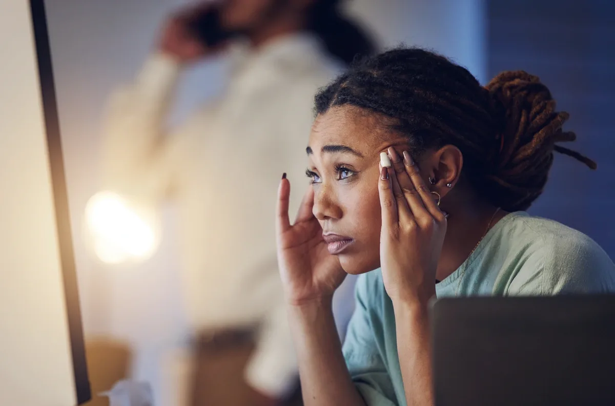 Stimulant Addiction: Woman with her hands on her head